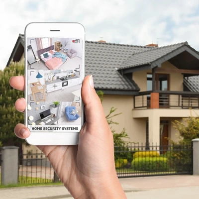 College Station vivint phone display of cctv live feed in front of a house